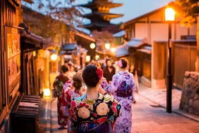 young women wearing traditional japanese kimono at yasaka pagoda and sannen zaka street in kyoto, japan