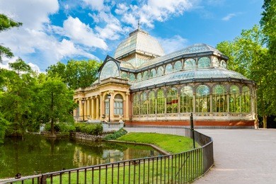 crystal palace (palacio de cristal) in retiro park, madrid, spain