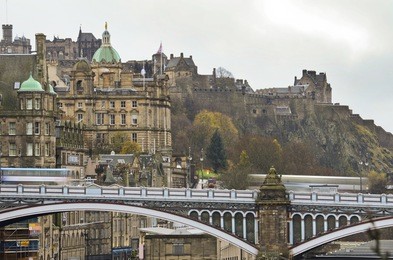 view of north bridge and edinburgh castle from regent road, edinburgh, scotland