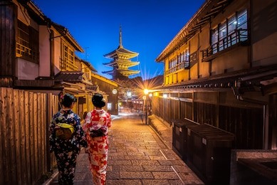 young women wearing traditional japanese kimono at yasaka pagoda and sannen zaka street in kyoto, japan.