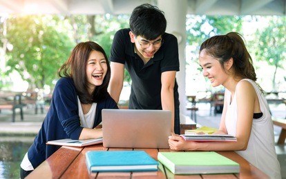 students asian together group teenager studying smile with laptop computer, school folders reading book at university campus college knowledge center for study learning bright idea in summer holiday. 