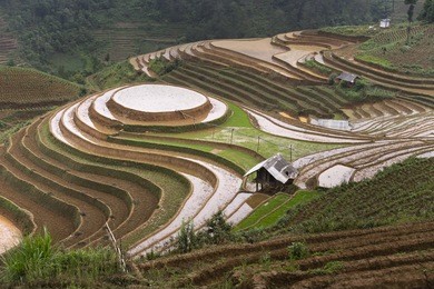 terraced rice fields in spilling water season. preparation before growing rice on terraced fields in mucangchai, yen bai, vietnam