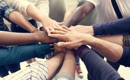 startup business people teamwork cooperation hands together