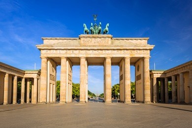 the brandenburg gate in berlin at sunrise, germany