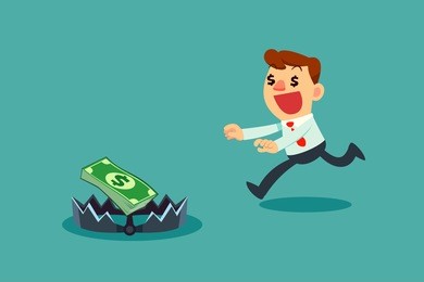 greedy businessman running to money on bear trap
