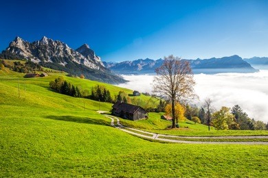 fog surrounding grosser, kleiner mythen, lake lucerne, rigi mountain and brunnen city from sattel, central switzerland. 