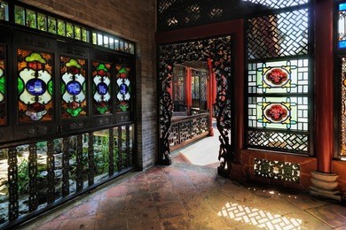 small passage in chinese traditional style and stained glass windows