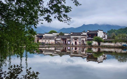 moon lake in hongcun village, china. hongcun is ancient village in anhui province, near the southwest slope of mount huangshan.
