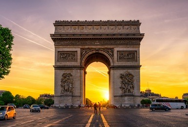 paris arc de triomphe (triumphal arch) in chaps elysees at sunset, paris, france. architecture and landmarks of paris. postcard of paris