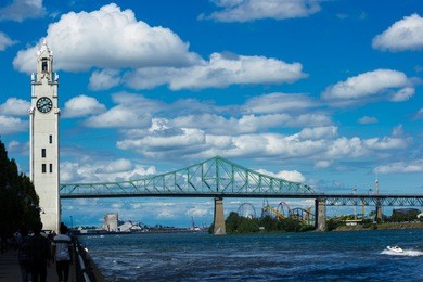 landscape orientation of the old port clock tower in montreal on the st. lawrence river.