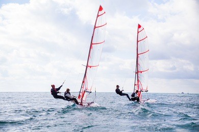 regatta of sailing yachts on the sea on a windy day