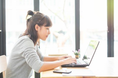girl doing research on laptop.