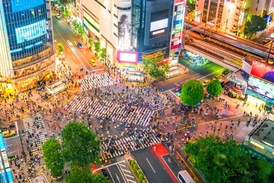 shibuya crossing from top view at twilight in tokyo, japan