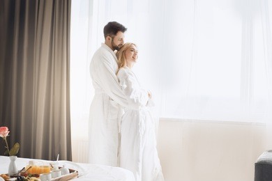 young couple travel together hotel room leisure