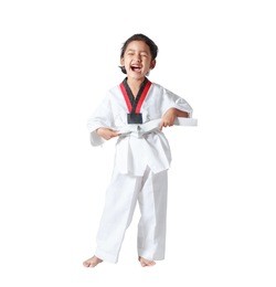 happy asian little girl laugh and tie a white line in taekwondo uniform isolated on white background, with clipping path