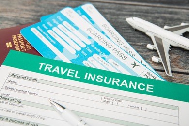 insurance form and tickets. travel and vacation insurance concept.