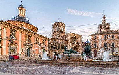 virgen square with cathedral and turia fountain in valencia, spain