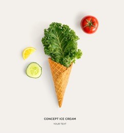 ice cream cone with kale, tomato, cucumber and lemon. flat lay. food concept.
