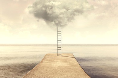 surreal ladder rises up into the sky in a silent sea landscape