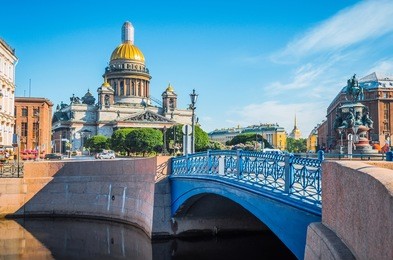 st. isaac's cathedral in the morning in the summer, and a view of the river and blue bridge