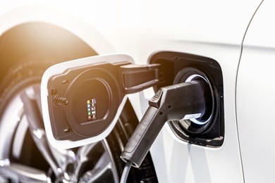 electrical car charging from public battery charging system, selective focus