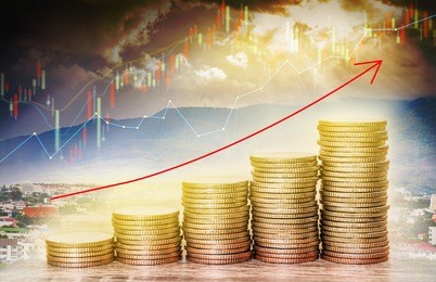 double exposure of financial graph chart and rows of coins with red arrow indicates economic growing and blurred growth of the city background, concept of economy and finance.