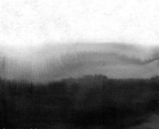 abstract black ink wash painting in east asian style on rice paper background. grunge texture. traditional japanese ink painting sumi-e.