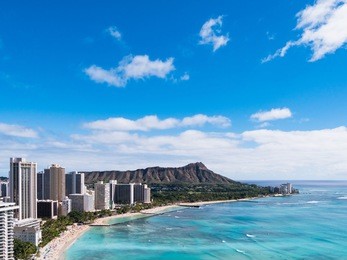 waikiki beach and diamond head crater including the hotels and buildings in waikiki, honolulu, oahu island, hawaii, usa