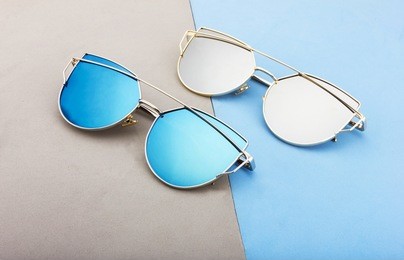 creative shoot of sunglasses with colorful background and cool props.