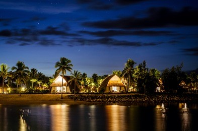 lagoon and bure view in fiji during blue hour