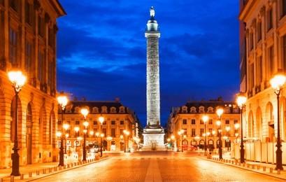 the vendome column , the place vendome at night, paris, france.