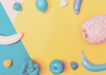 painted fruit on a faded blue and yellow background