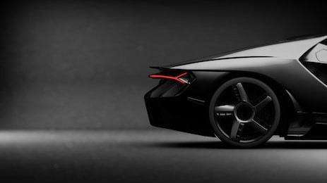 generic black sports car (with grunge overlay), tail lights detail - side view - 3d illustration