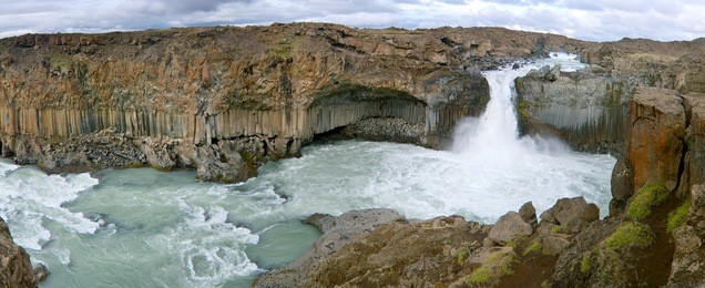 a panorama of  'aldeyjarfoss', a well known waterfall in iceland with unique rock formation