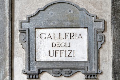 galleria degli uffizi street sign on the wall, florence, tuscany, italy