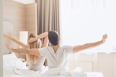 young couple travel together hotel room leisure