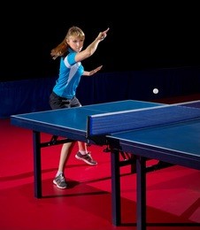 young woman table tennis player isolated