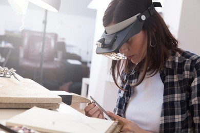 jeweler at work, crafting in a jewelry workshop.
