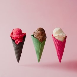various ice cream on pink pastel background. summer creative concept.