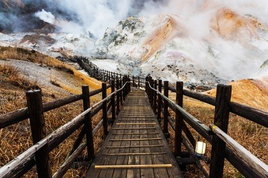 jigokudani hell valley walking path in late evening, noboribetsu, hokkaido, japan.