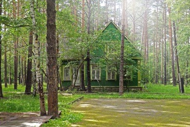 classic russian house in the woods. forest park shartashskiy, ekaterinburg, sverdlovsk oblast, russia.