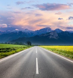 road through countryside landscape to the mountain