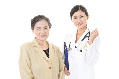 a friendly female doctor and an elderly woman
