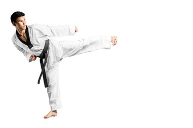 portrait of an asian professional taekwondo black belt degree (dan) kick. isolated full length on white background with copy space and clipping path