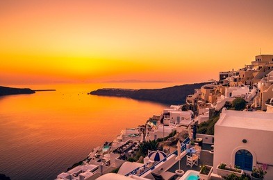 santorini, cyclades islands, greece. sunset over imerovigli near thira town and firostefani.