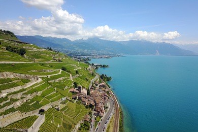 aerial image of lavaux vineyards in switzerland featuring the charming village of saint saphorin.