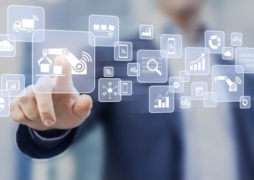 smart factory or industry 4.0 concept where internet of things (iot) helps connect robots with cloud computing and increase automation, person touching virtual interface