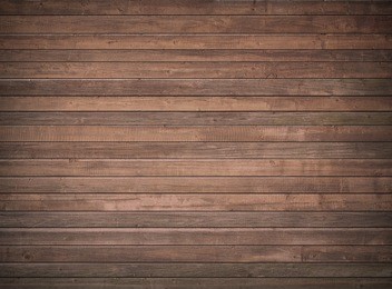 brown wooden wall, table, floor surface. dark wood texture.