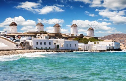 famous windmills over the town of mykonos, cyclades, greece