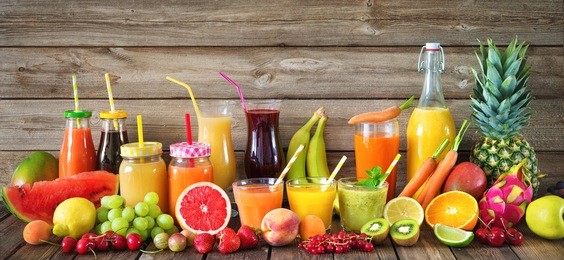 various freshly squeezed fruits and vegetables juices